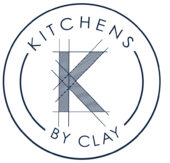 Kitchens by Clay circle logo white with blue letters